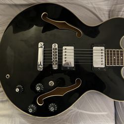Sebring Electric Guitar $245