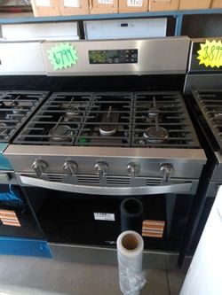 Whirlpool stainless steel gas stove 5 burner and REPAIRS