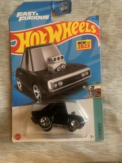 Black 1970 Dodge Charger Hot Wheels diecast car #HotWheels #DiecastCars