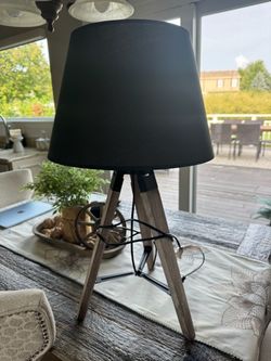 Gray small lamp with black shade
