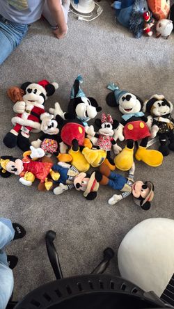 9 collectible mickeys including one Minnie