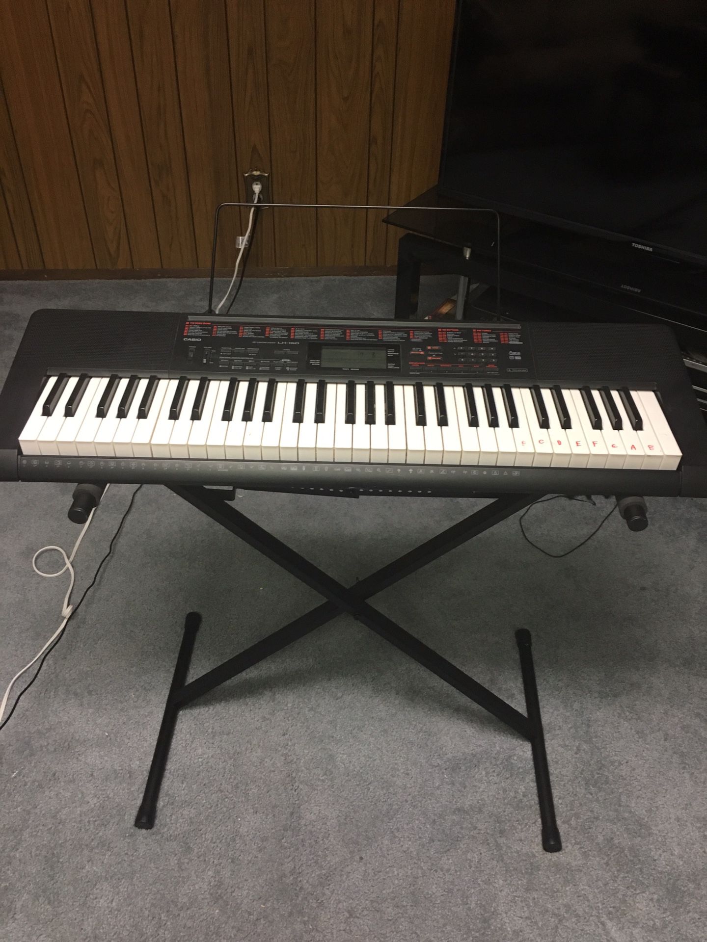 Casio LK-160 electric keyboard with stand
