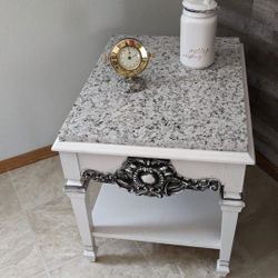 wooden coffee table with granite top and a handy shelf underneath