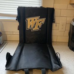 NEW WAKE FOREST STADIUM SEAT WITH CARRYING STRAP ASKING $25 - COMPARE TO $38.00 AT WALMART 