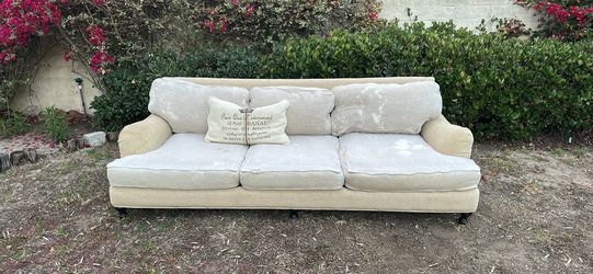 Off white down filled sofa couch