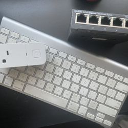 Apple Magic Keyboard, Wi-Fi Smart Plug, 5-Port Smart Switch 