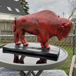 The red hot buffalo statue