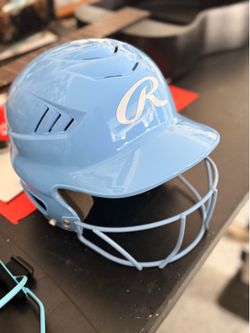 Brand new Rawlings helmet and mask