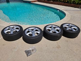 4 slightly used Mercedes Benz Rims and tires