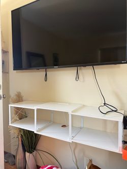 White Floating Wall-Mounted Media Shelf