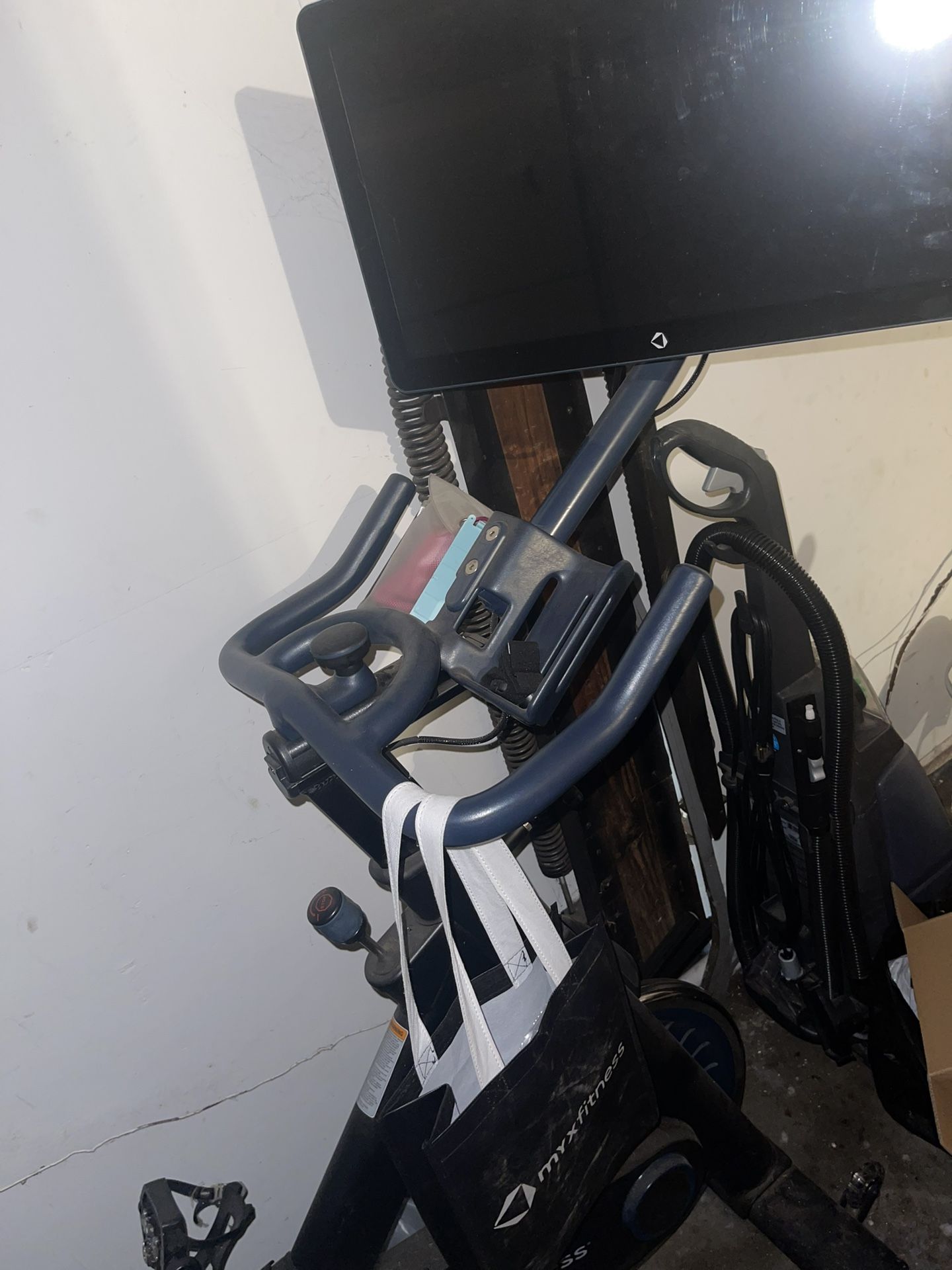 Exercise bike w/ attached screen devices