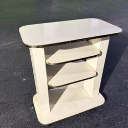 multi-shelf TV stand or service cart on wheels