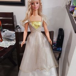 1992 Mattel " My size" Barbie doll.  3 feet and 36 inches tall.  Long hair. white and gold gown.  Vintage.  Collectible.  Good condition. 