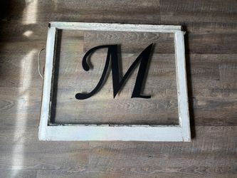 Window With “M”