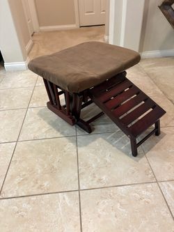 Wooden cushioned rocking ottoman