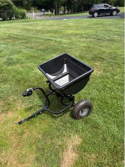 Seed fertilizer spreader