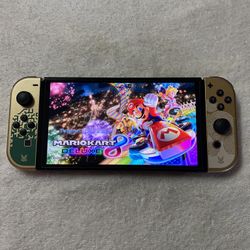 NINTENDO SWITCH OLED with 100 Switch Games And 7000 Retro Games