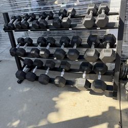5-8-10-12-15-20-25-30-35-40-45-50 pounds rubber hex coated dumbbells. And dumbbells rack. In good condition  pick up in sun valley cash only 