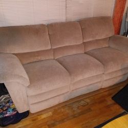 Reclining Tan Microfiber Reclining Sofa. Like New 