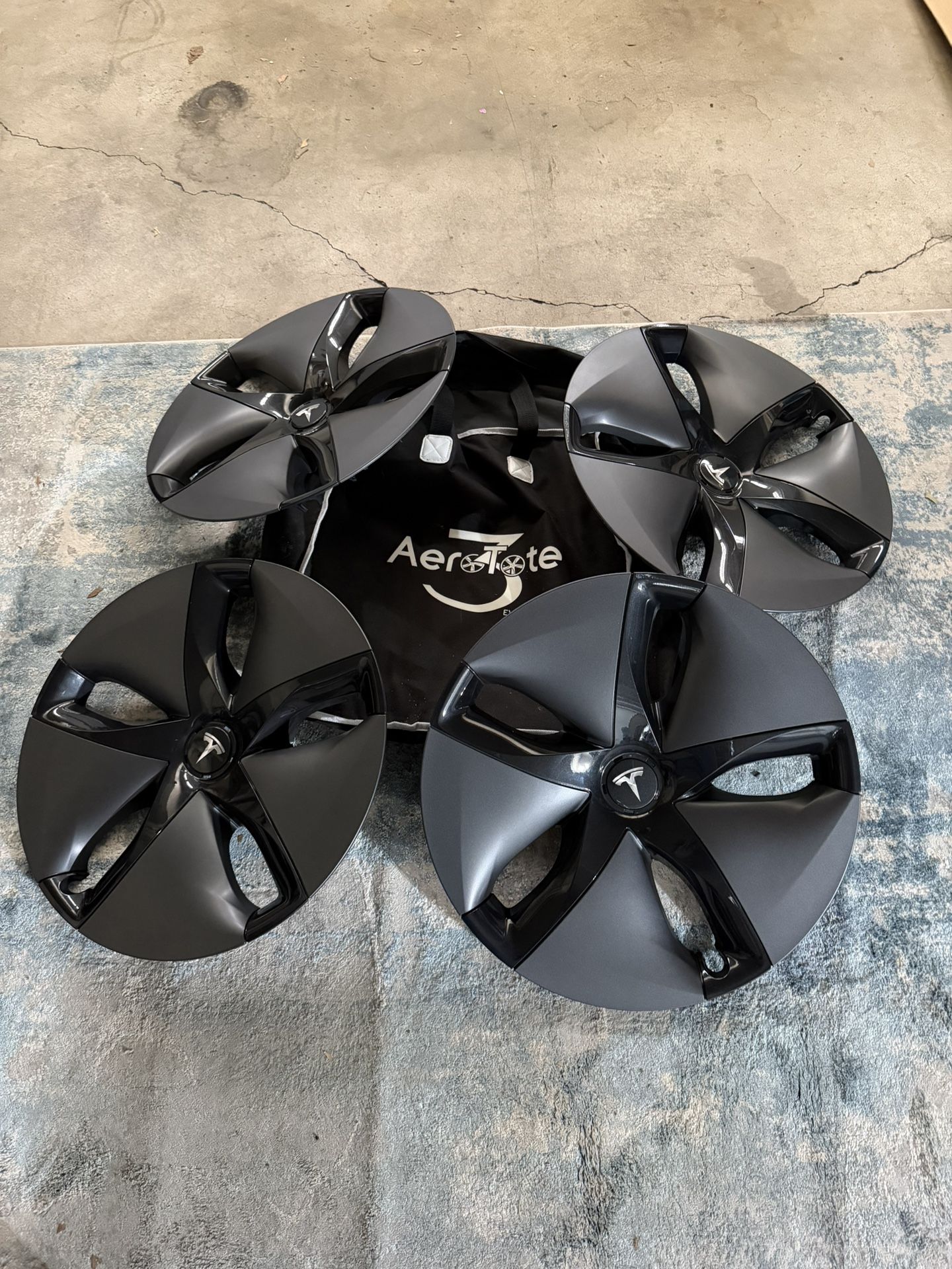 Like New OEM Tesla Model 3 Aero Covers w/ Holding Case