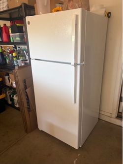 GE Brand New Fridge in white.