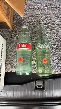 Larger Coca Cola bottles
