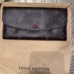 Louis Vuitton “ Emelie Wallet”