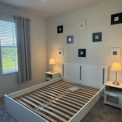 Queen bed | 2 nightstands | 2 table lamps | blackout curtain