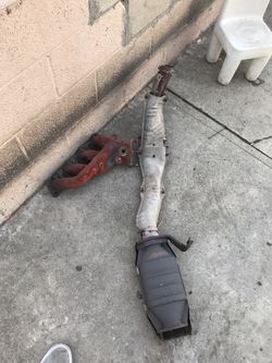 Stock 240sx twin cam header and cat