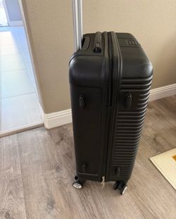 25 inches luggage with rolling wheels