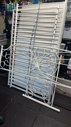 Cream Trundle Metal Bed Frame with Decorative Headboard