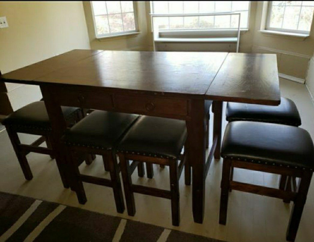 Solid wood dining table with 8 stools