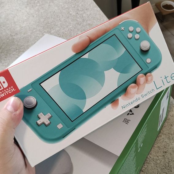 Nintendo Switch Lite CIB  LIKE NEW CONDITION 