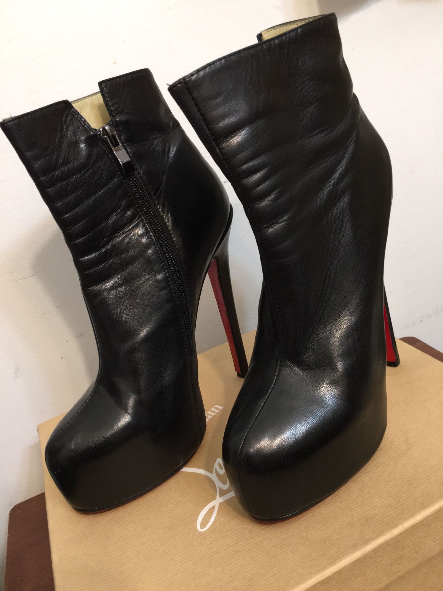 Christian Louboutin Black Leather Heels Ankle Boots. Size 37. 100 % Perfect and excellent condition