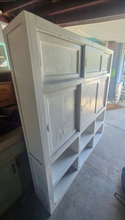 I literally just got this in 48hrs ago 
Vintage White sliding door cabinet
Came out of a kitchen in a house built in the early 1950s 
All solid wood h