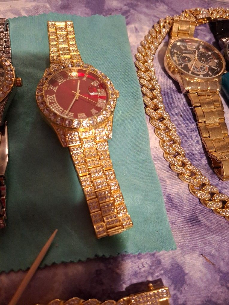Stainless steel , gold and silver color watch with red dial