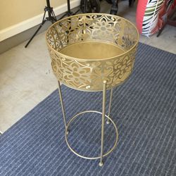 Plant stand gold in color $15