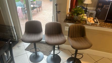 3 gray barstolls
