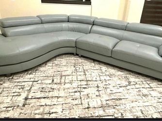 Upholstered in gray faux leather