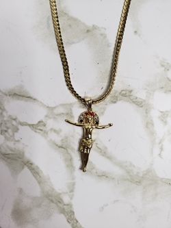 Gold chain with charm