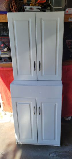 Tall White Storage Cabinet with Four Doors