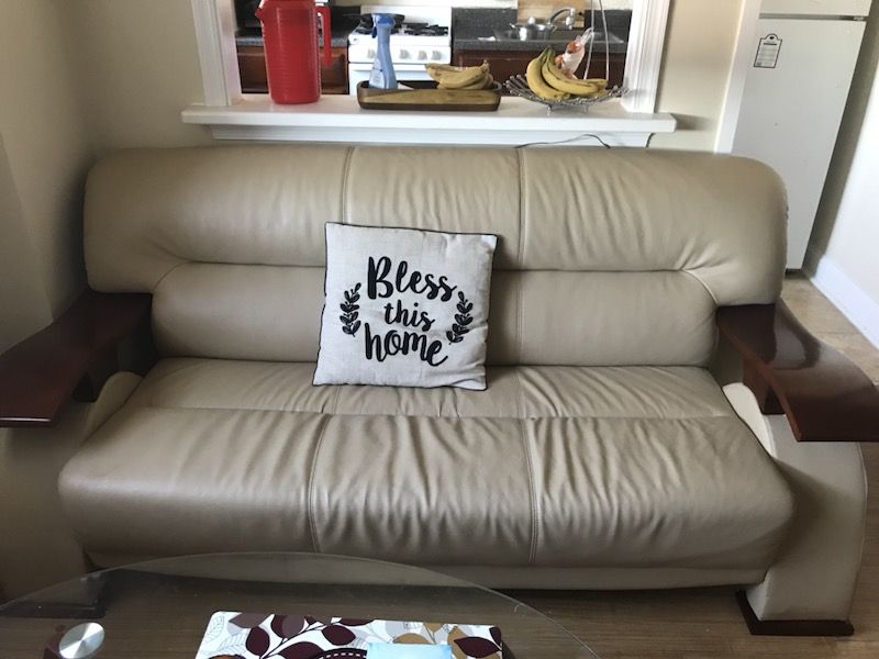 Beautiful genuine leather sofa. Beige and burgundy