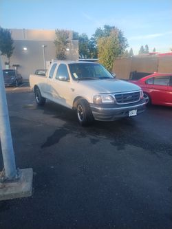 You're selling my 2000 Ford F-150 with a V8 Triton motor 2 40,000 MI transmission just been rebuilt