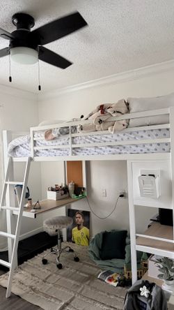 Twin metal bed frame with desk and shelving
