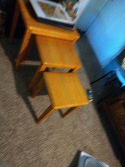 set of three stocking tables