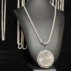 Italian silver rope chain with 1985 silver centenario with Nugget bezel or Versace bezel 
