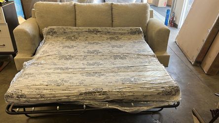 Soletren Stone Queen Sofa Sleeper
Ashley Furniture$10 Down Payment And Financing Available