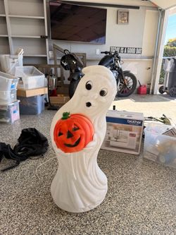Halloween Blow mold - General Foam Plastics Ghost Holding Pumpkin blow mold, roughly 33–34 inches tall