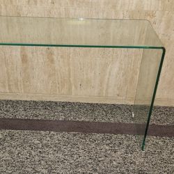bent glass console table. 44x14x30