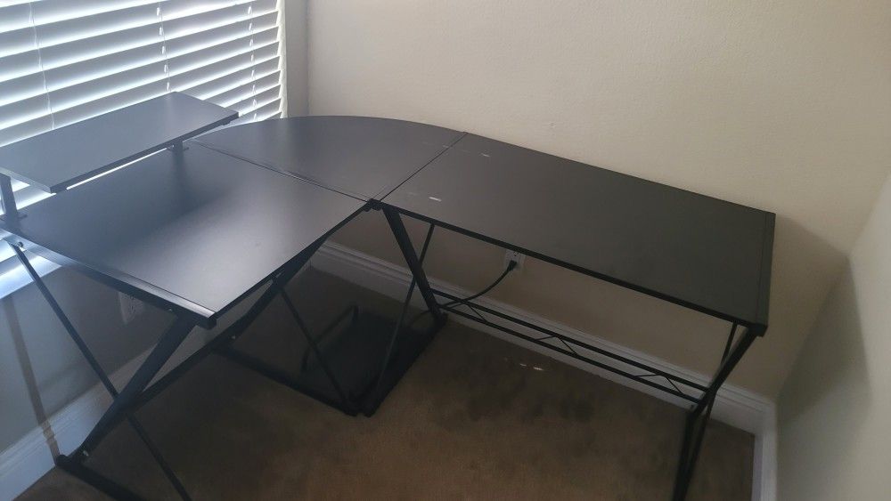 Two Desks And A Gaming Chair